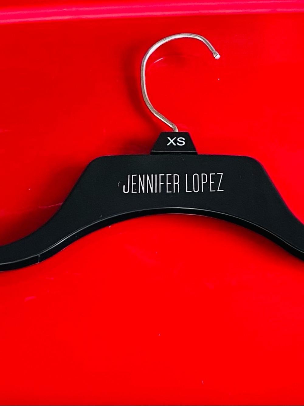 Jennifer Lopez Black and Silver Branded Hanger